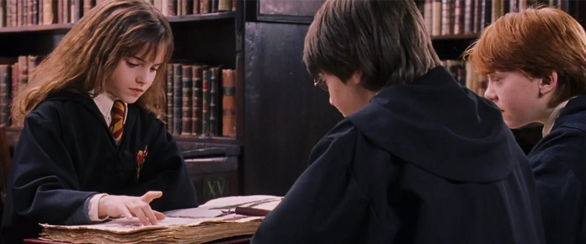 Гаррі, Рон і Герміона в бібліотеці